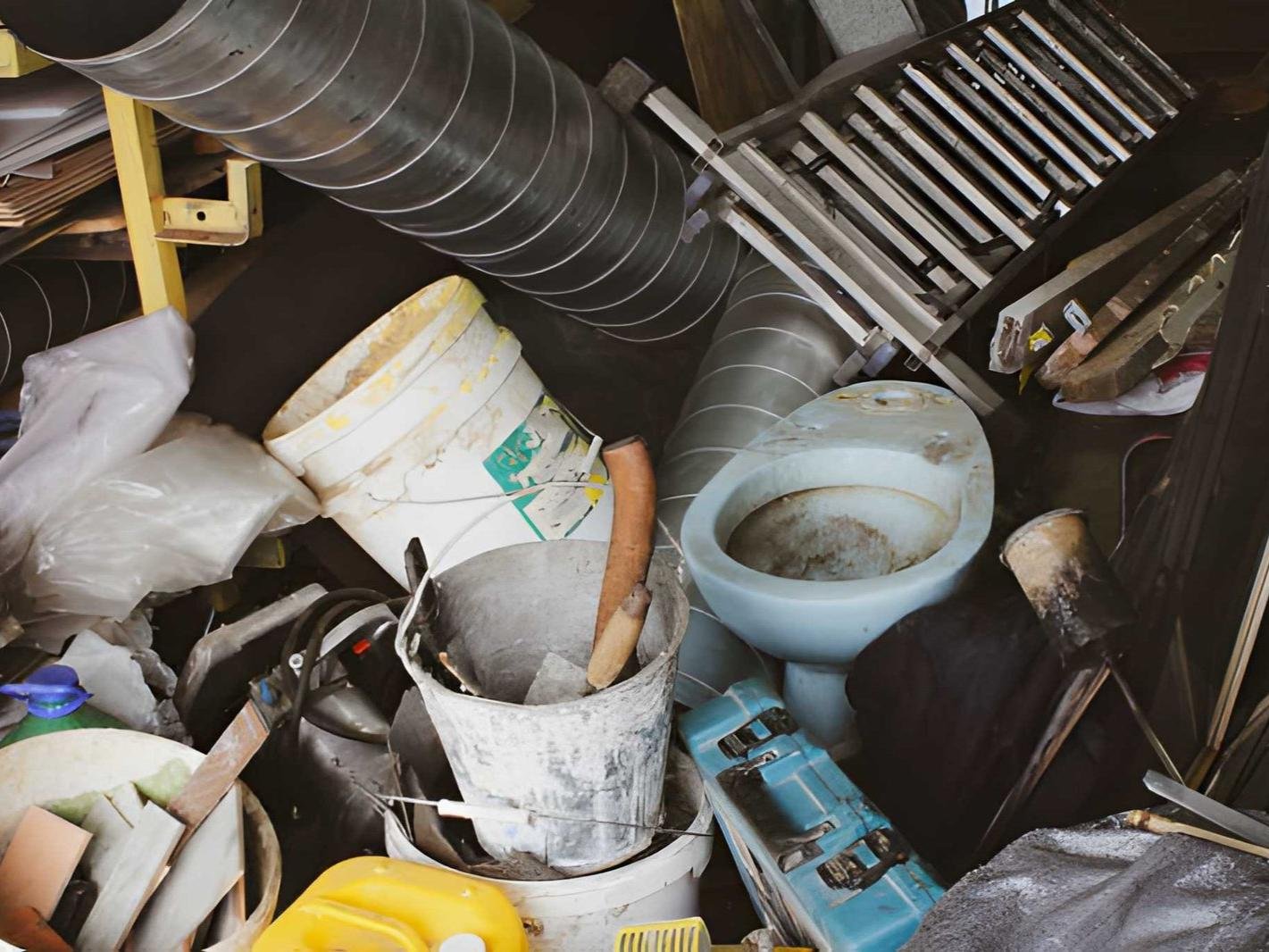 Cluttered storage space filled with various household items