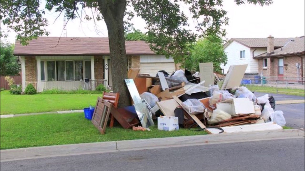 Area piled with unwanted items before junk hauling